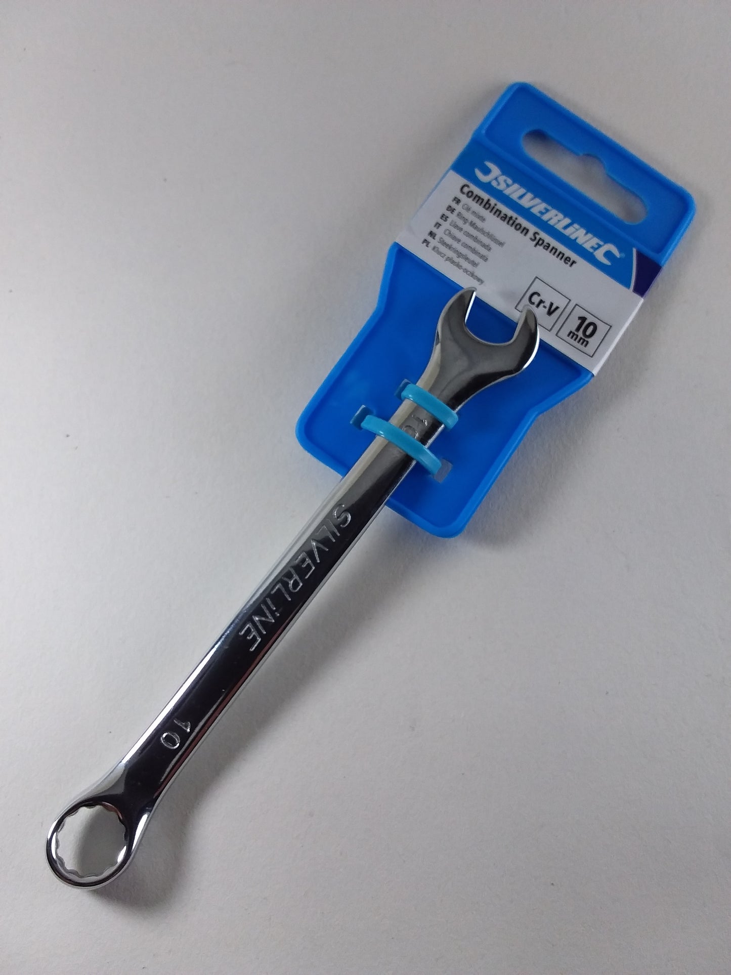 A 10mm combination spanner with a blue and white handle, packaged.