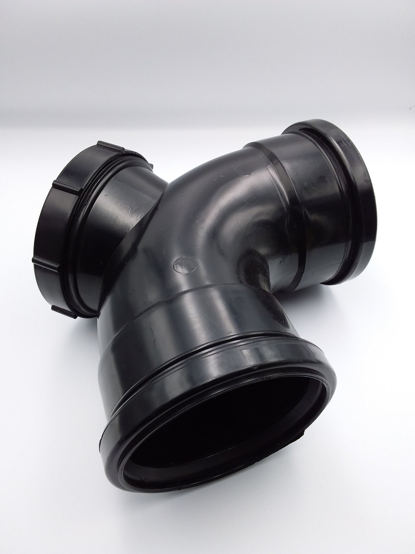 Black push fit access bend for plumbing, showing a 90-degree angle connection.