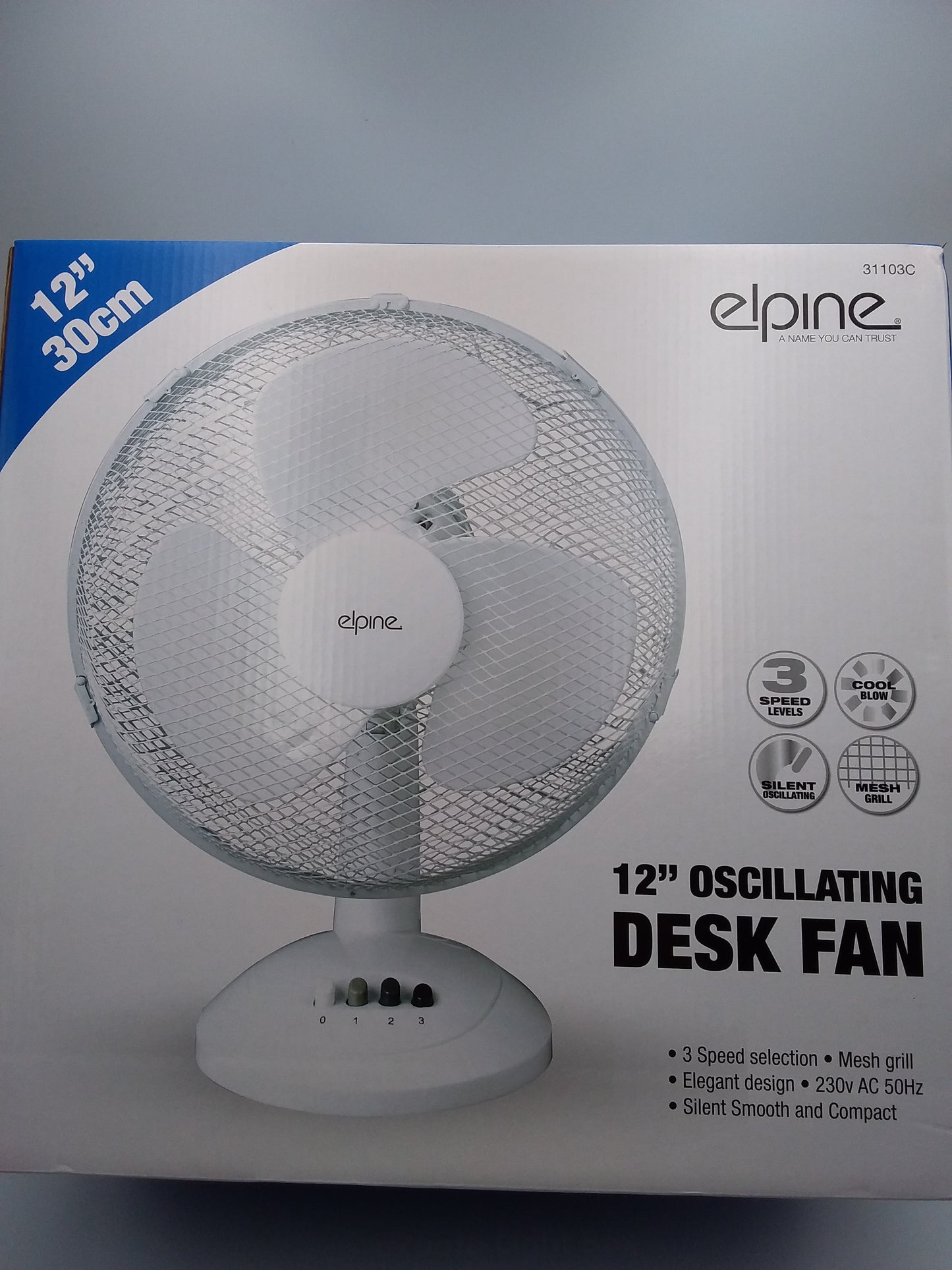 12-inch white desk fan by Elpine is packaged in a box showing the fan with protective mesh, control knobs, and a white finish.
