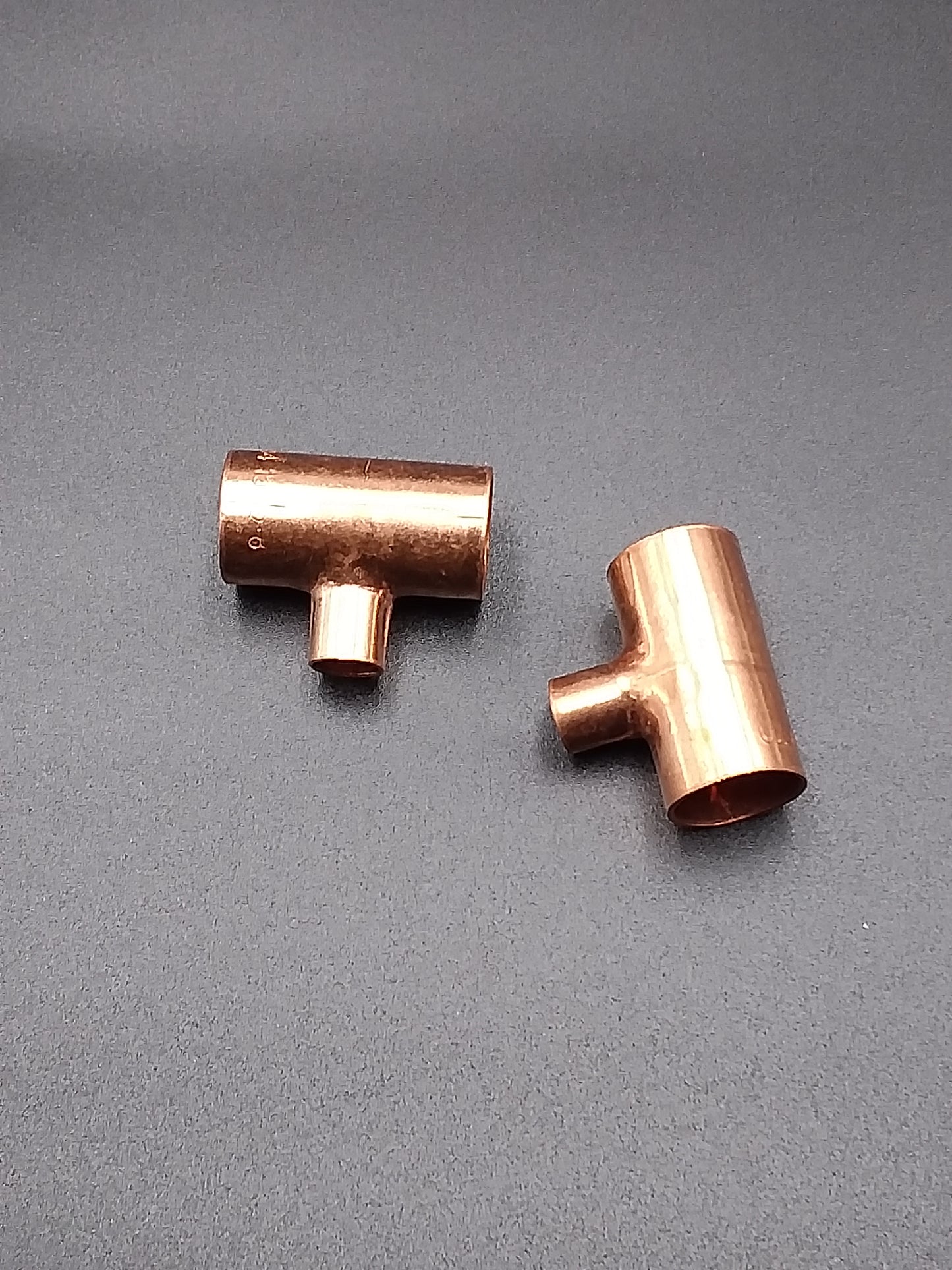 Copper end feed reducing tees.