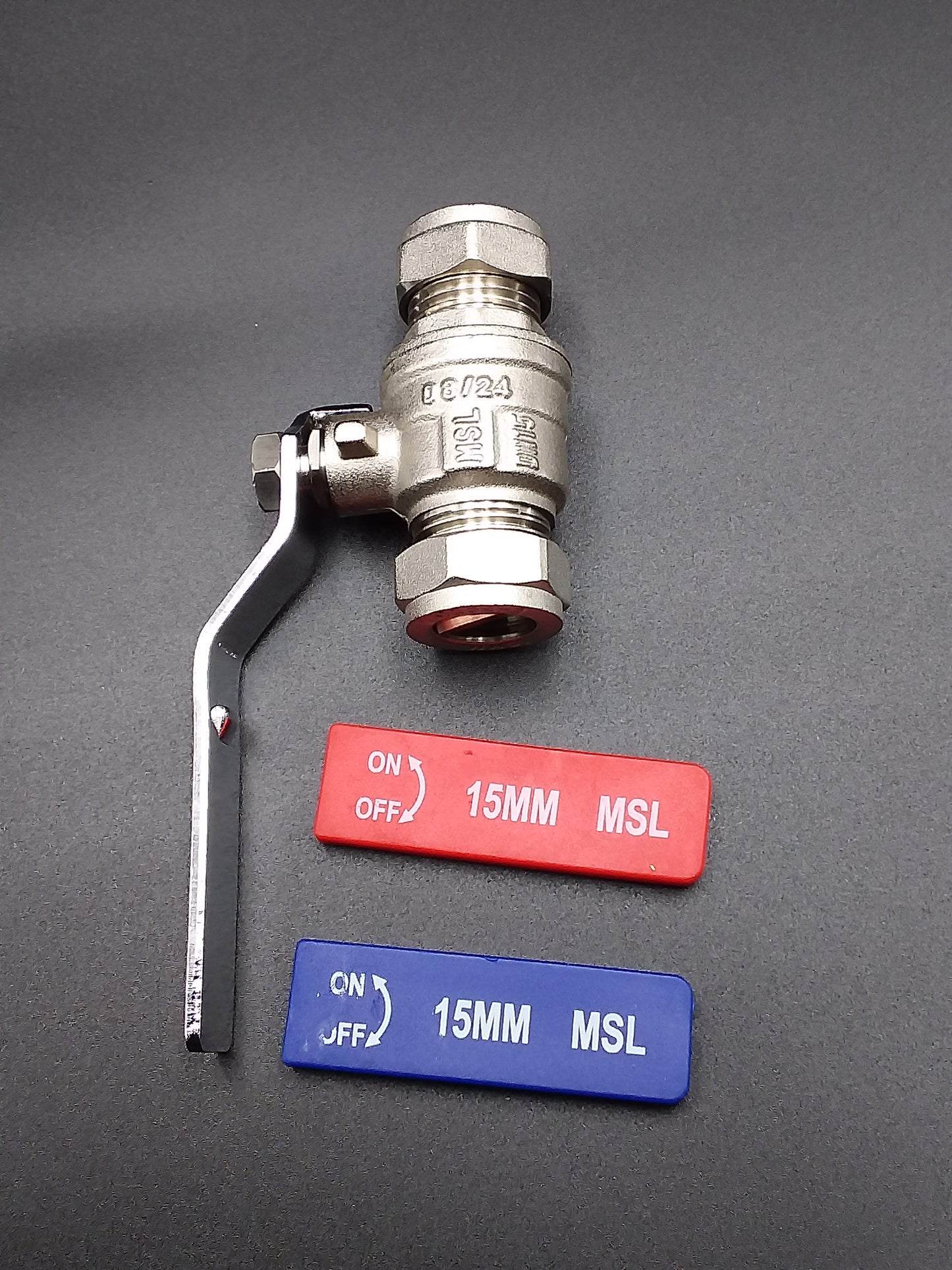 A 15mm blue and red lever valve with an on/off label and a metal handle.