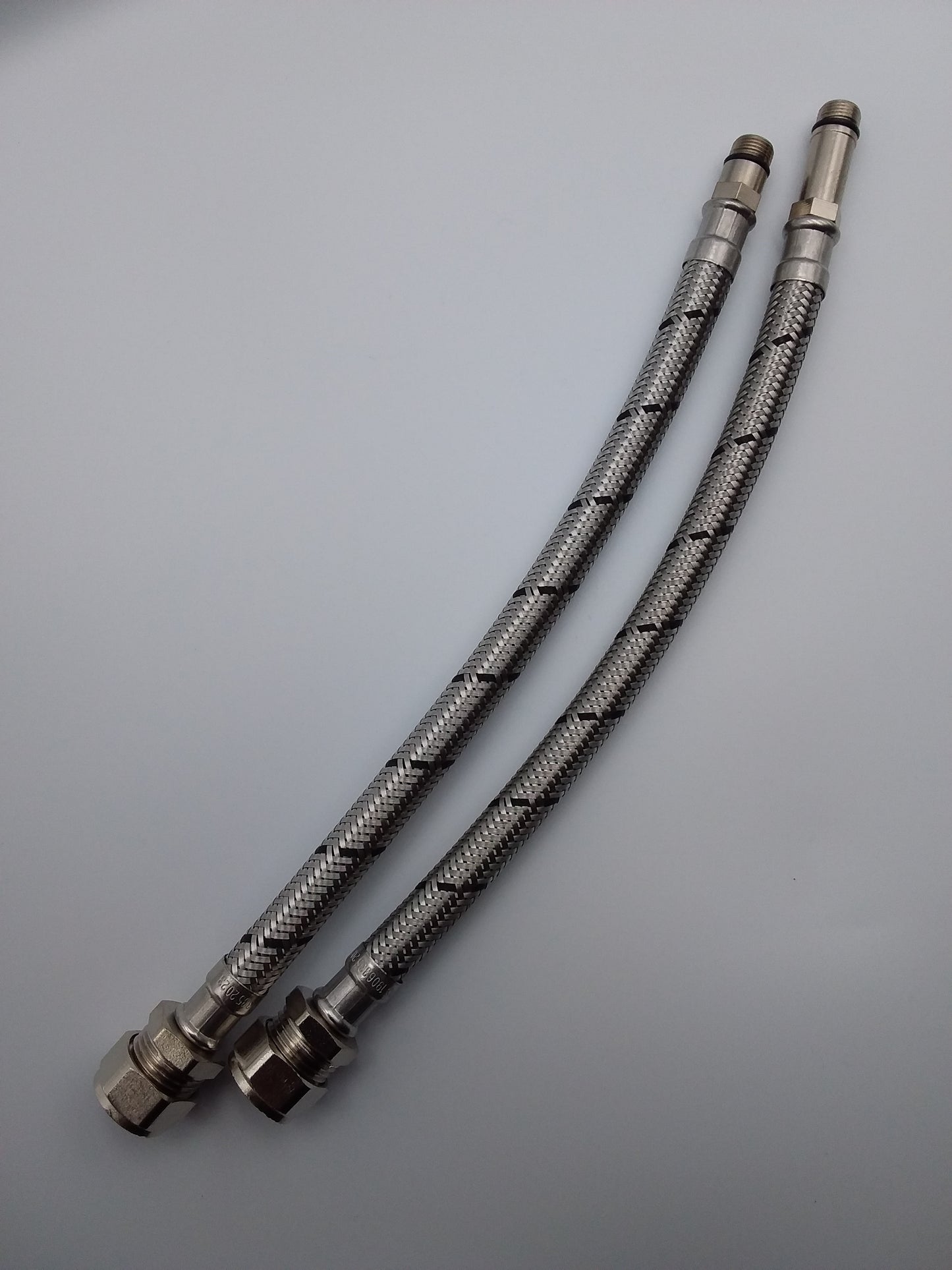 Two stainless steel mono flexible tap connectors.