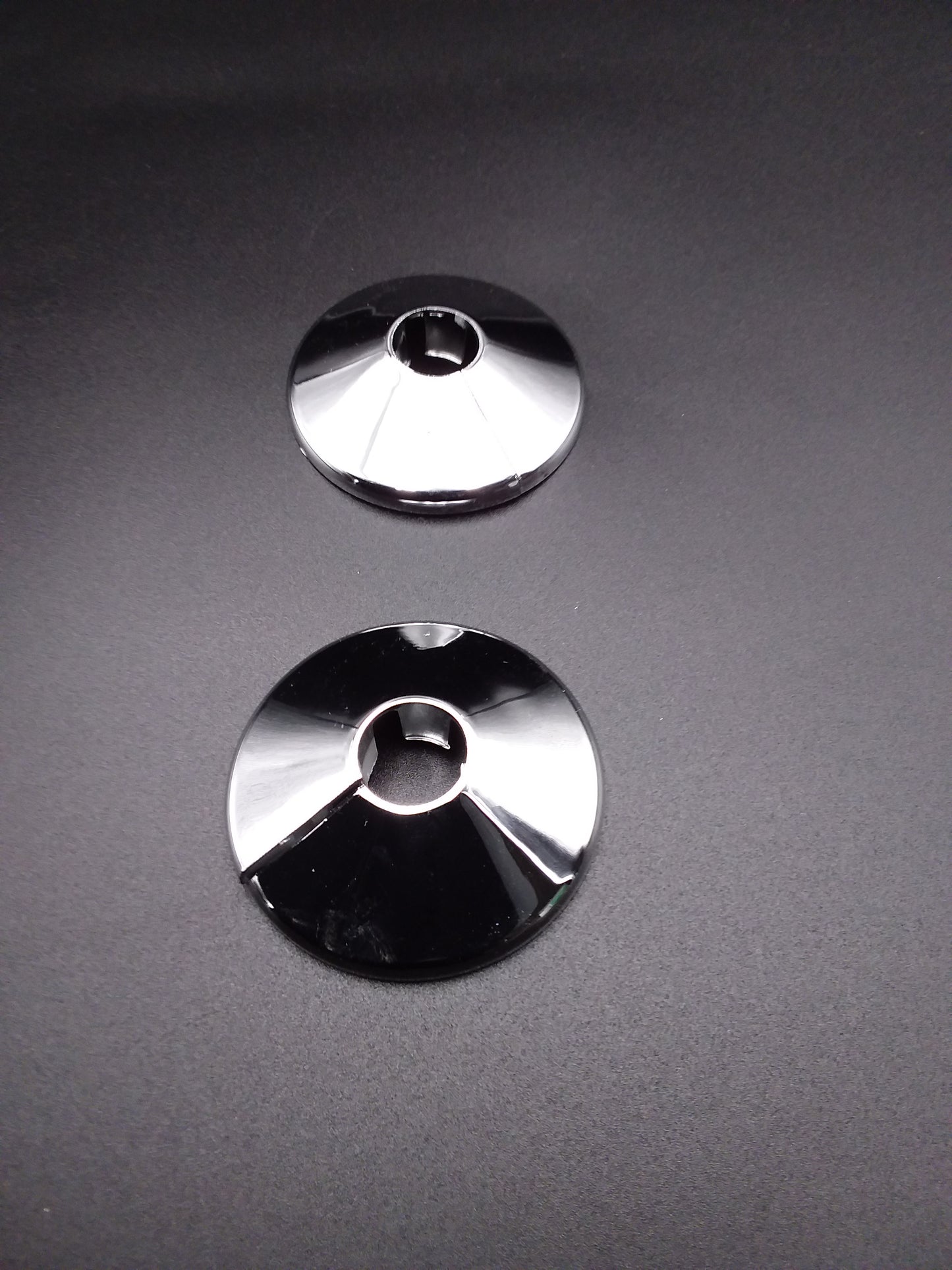 Silver chrome pipe collarsused for plumbing pipes.