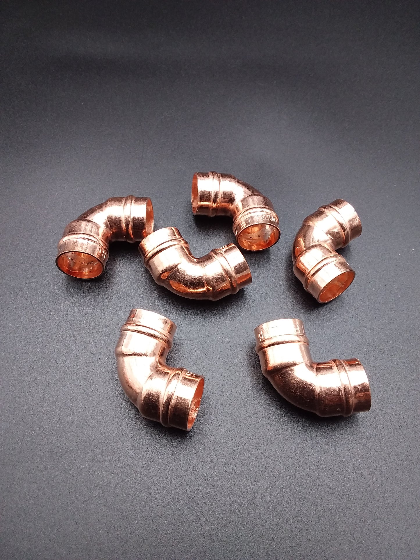 Copper solder ring elbows.