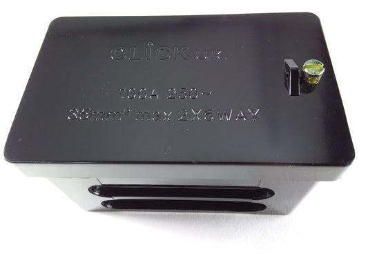 A black 100Amp double pole block electrical connector with branding visible on the top surface.