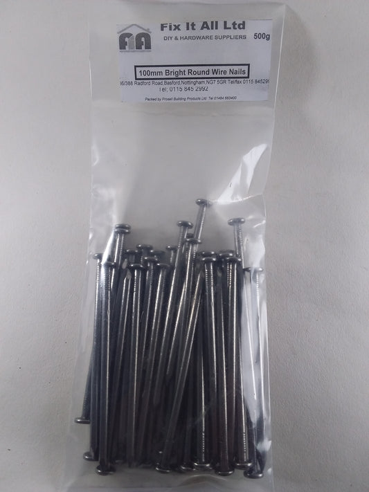 A pack of 100mm bright round wire nails, 500g, in a clear plastic bag with a label.
