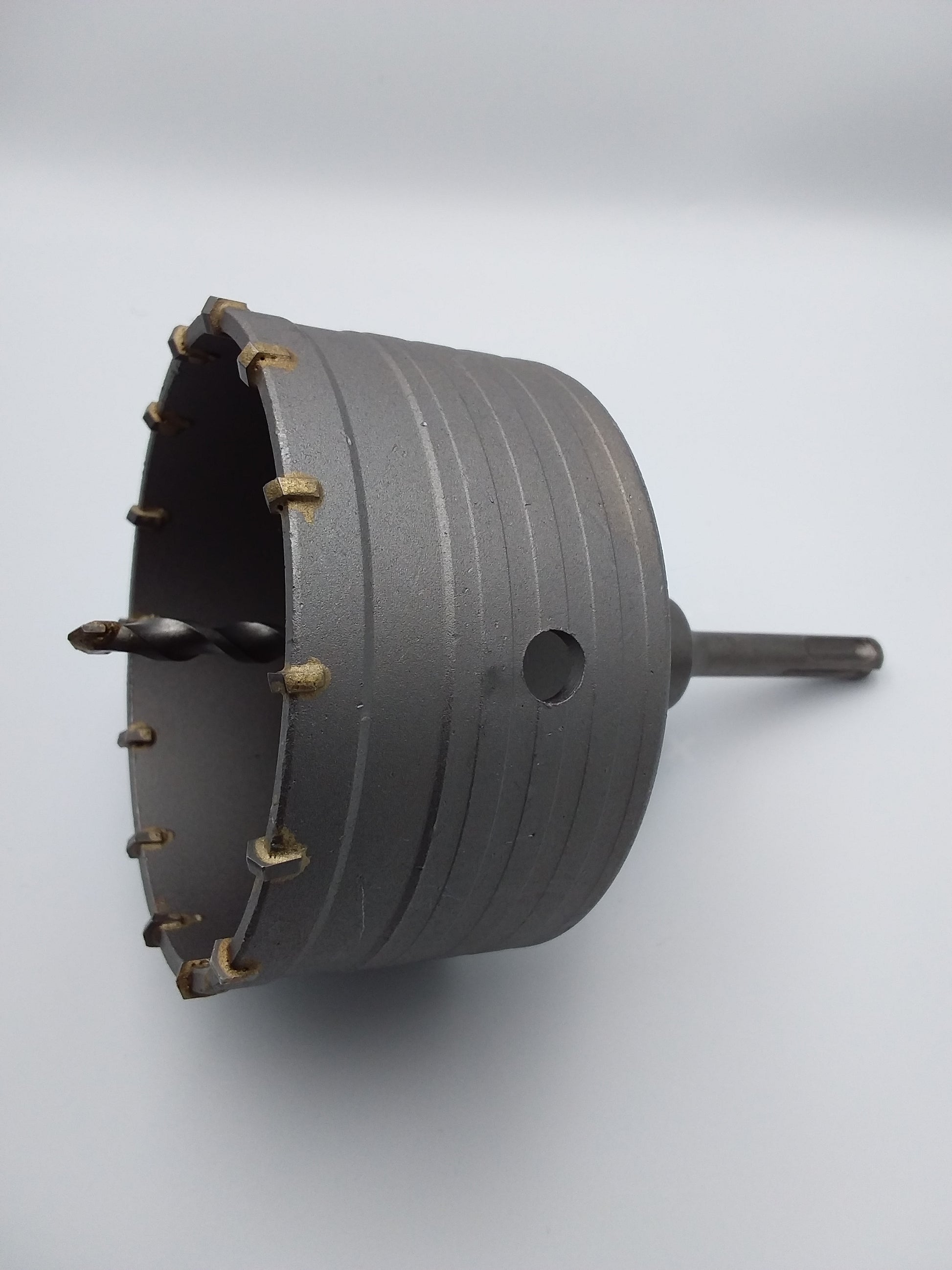 110mm TCT core drill with a 10mm SDS shank and fluted drill bits, designed for penetrating hard rock formations.