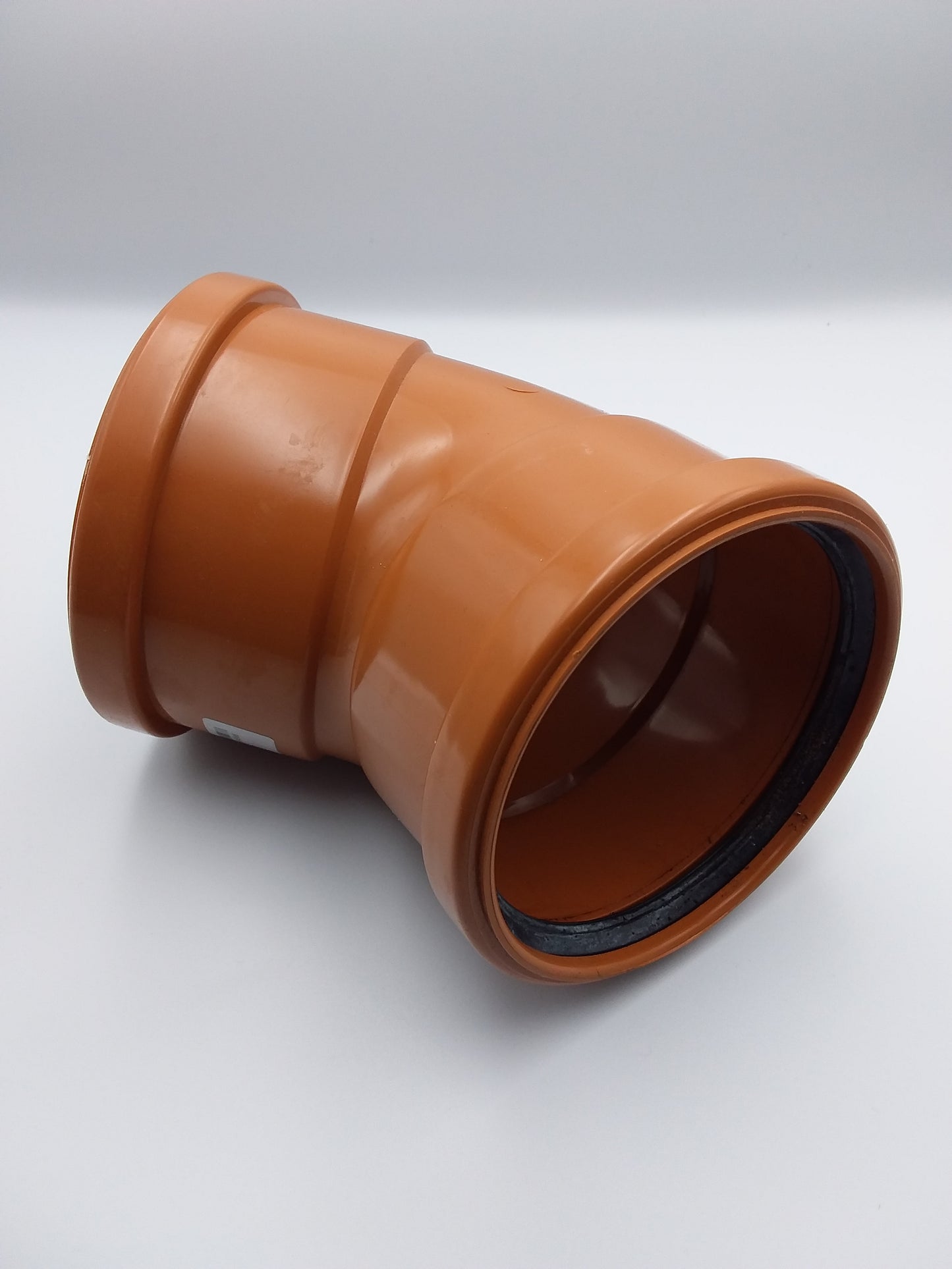 An orange 110mm D/S 45d Bend push fit underground bend.