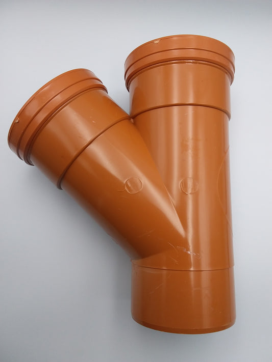 110mm Orange plastic garden hose fittings with a socket design for connecting to a hose system.