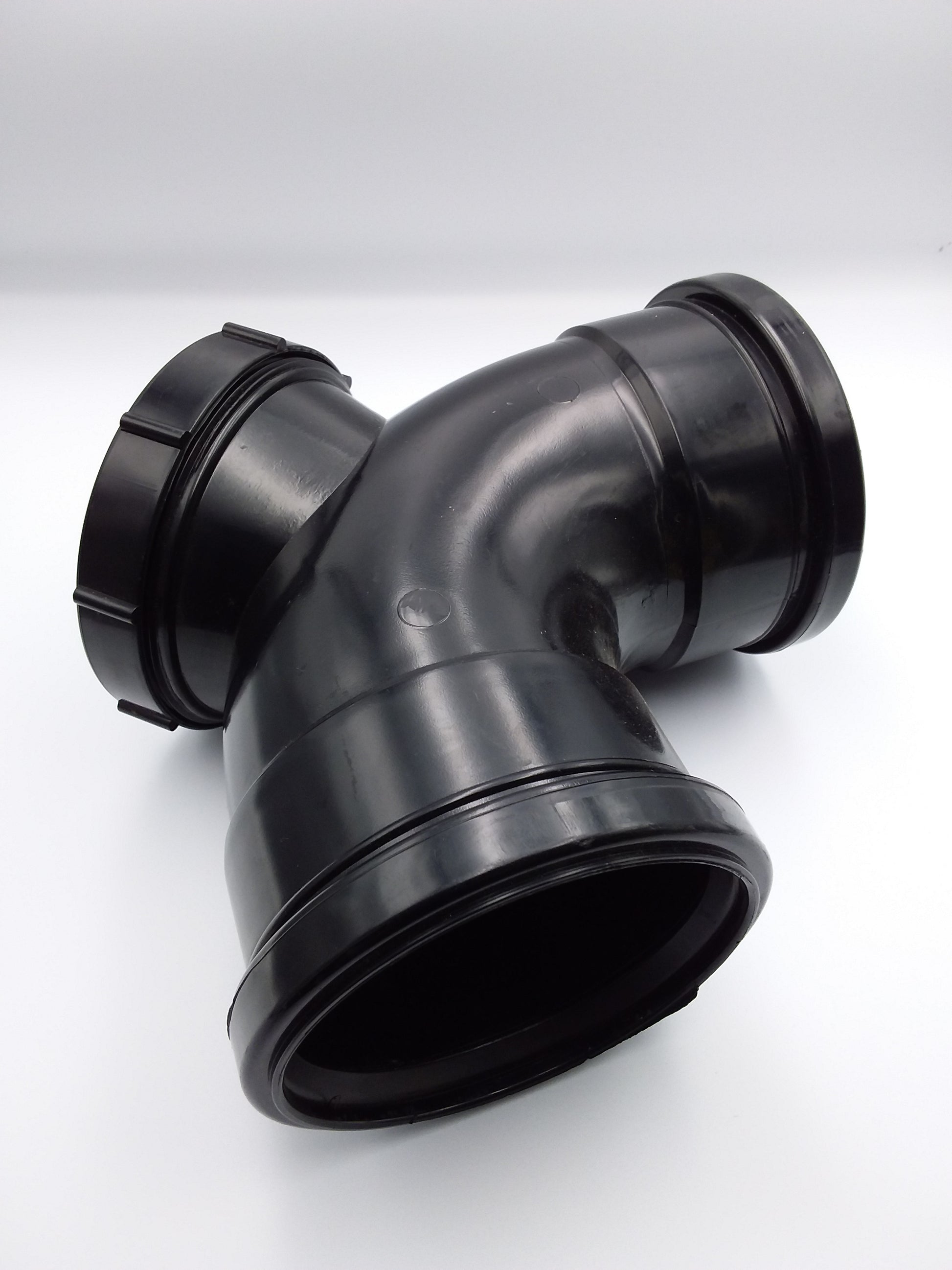 Black push fit access bend for plumbing, showing a 90-degree angle connection.