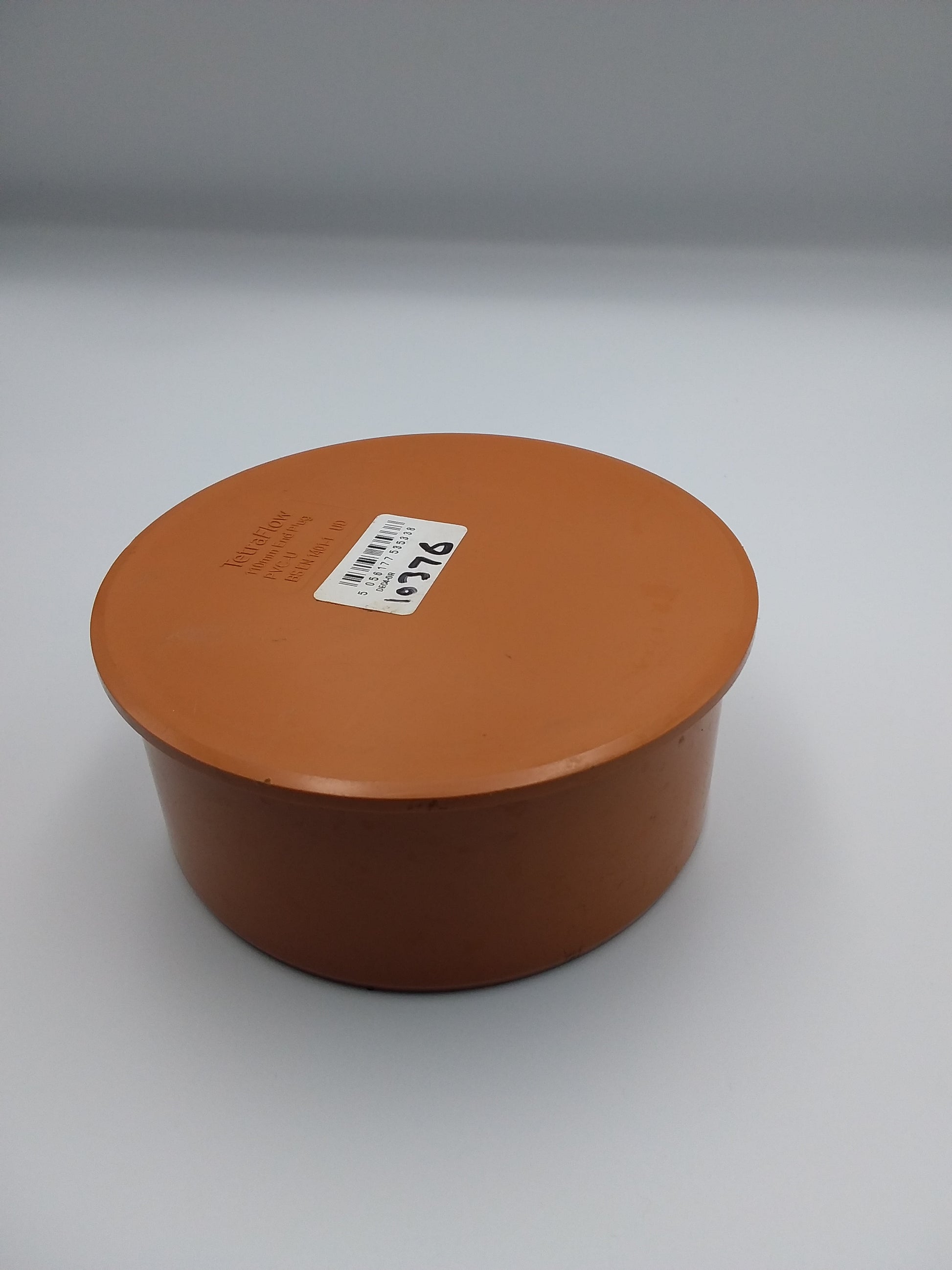 110mm orange push fit end cap for a plumbing pipe, 