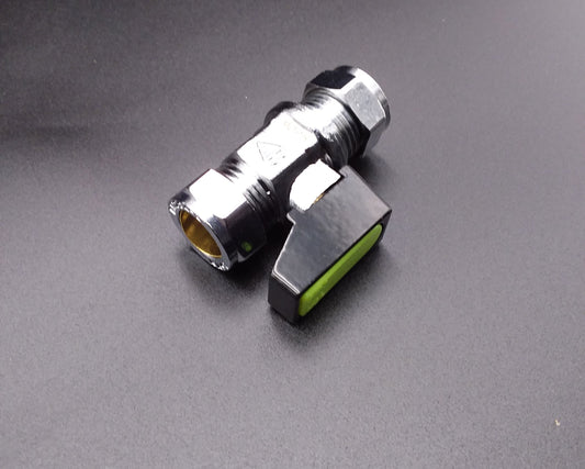 Chrome gas valve with a black handle, viewed from an angle against a plain background.