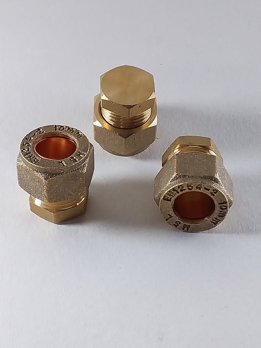 Brass plumbing caps off