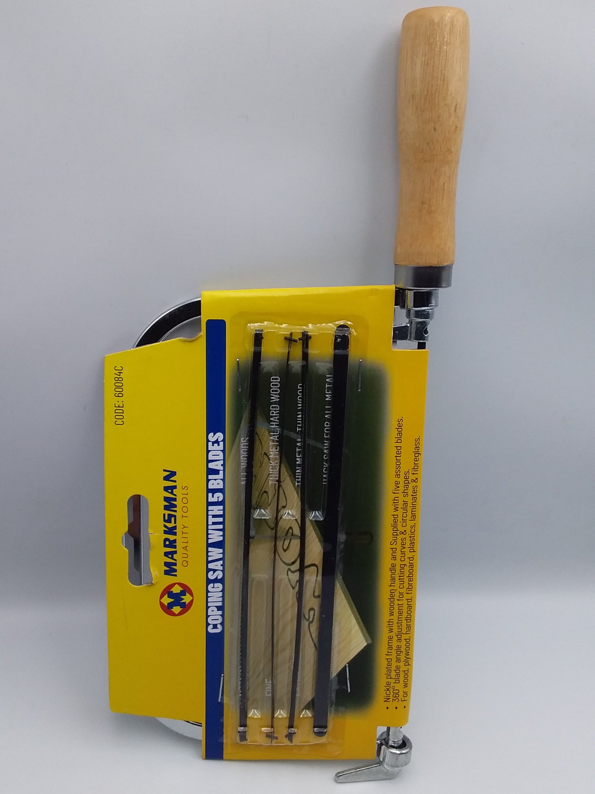 6.5 inch coping saw with a wooden handle and metal blades, displayed in front of its packaging that states 'Coping Saw with 5 Blades'.