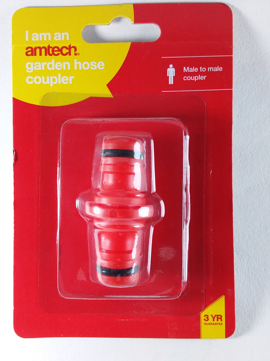 A red double male connector for garden hoses, packaged in a clear plastic blister on a red card with product information.