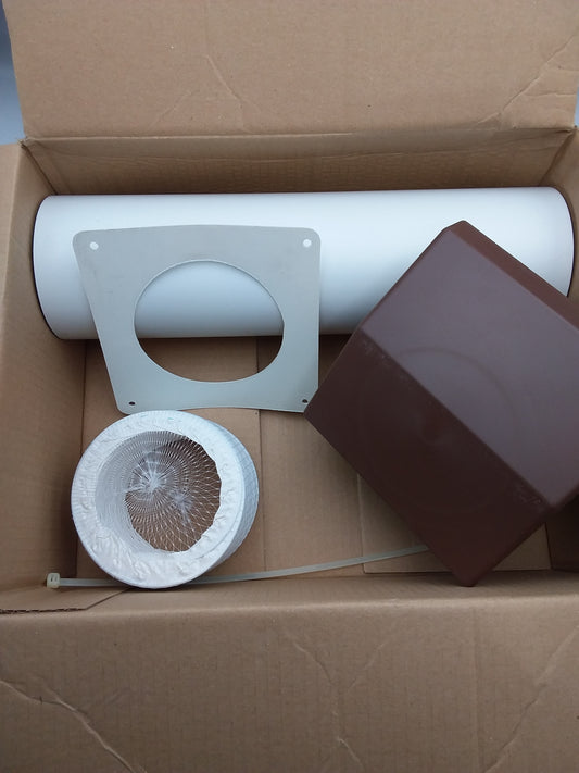 A 100mm x 2m Duct kit displayed inside an open cardboard box, including a white duct, a brown access cover, and other components.