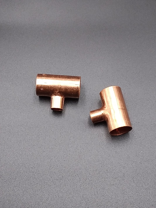 Copper end feed reducing tees.