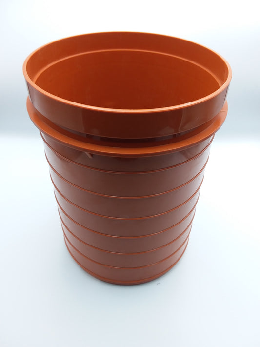 A brown 110mm Bottle gully riser, used for drain purposes in building construction.