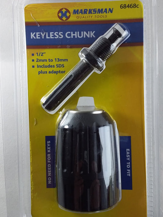 A 1/2 inch SDS keyless chuck by Marsman, displayed in a clear plastic packaging with a yellow background. The chuck is silver-colored and designed for drill bits.