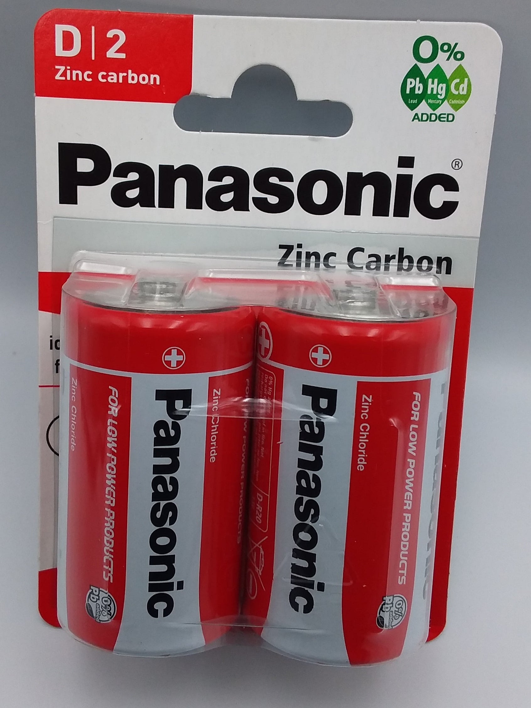 Two D-size Panasonic zinc carbon batteries in red and white packaging.