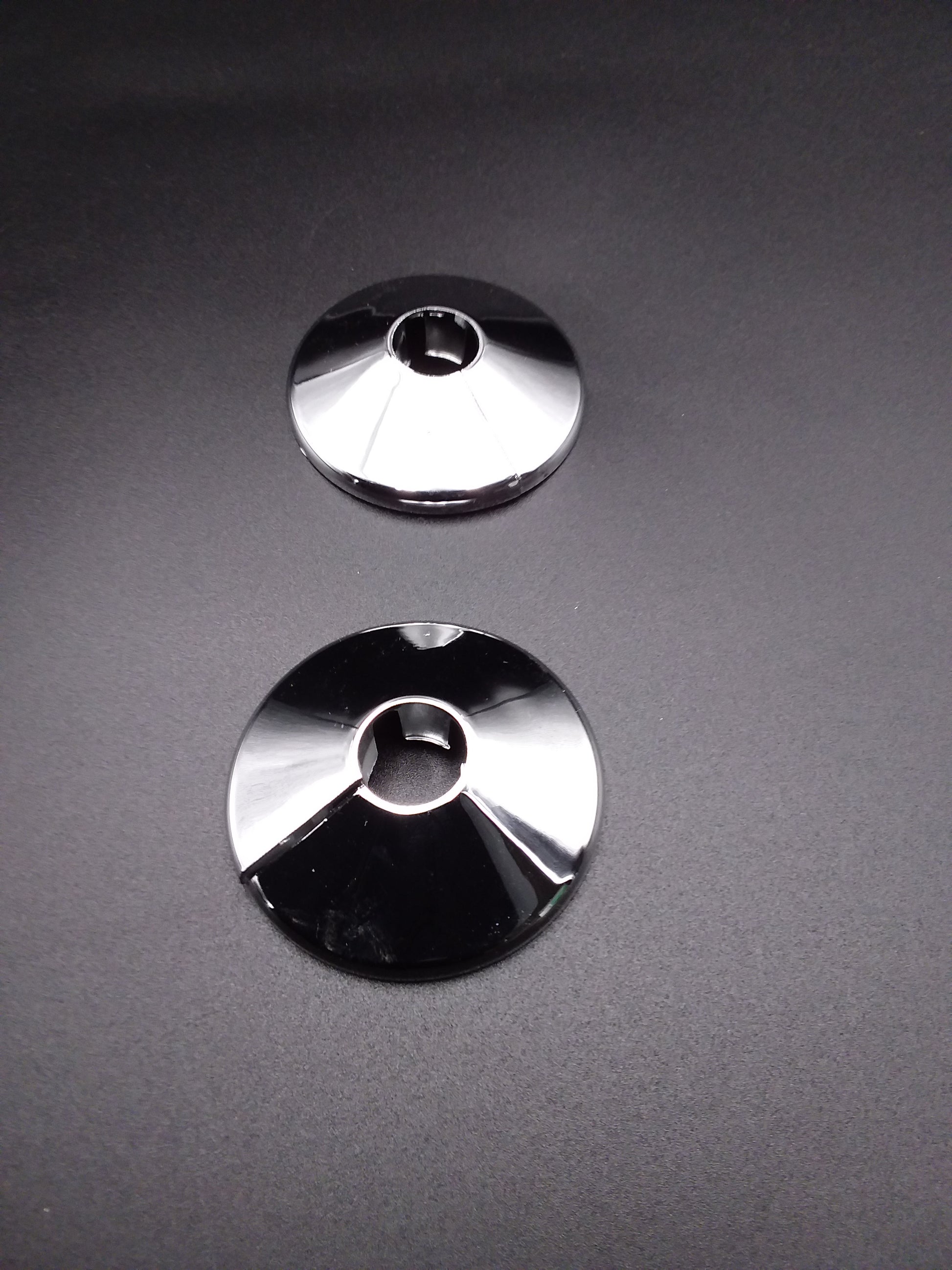 Silver chrome pipe collarsused for plumbing pipes.