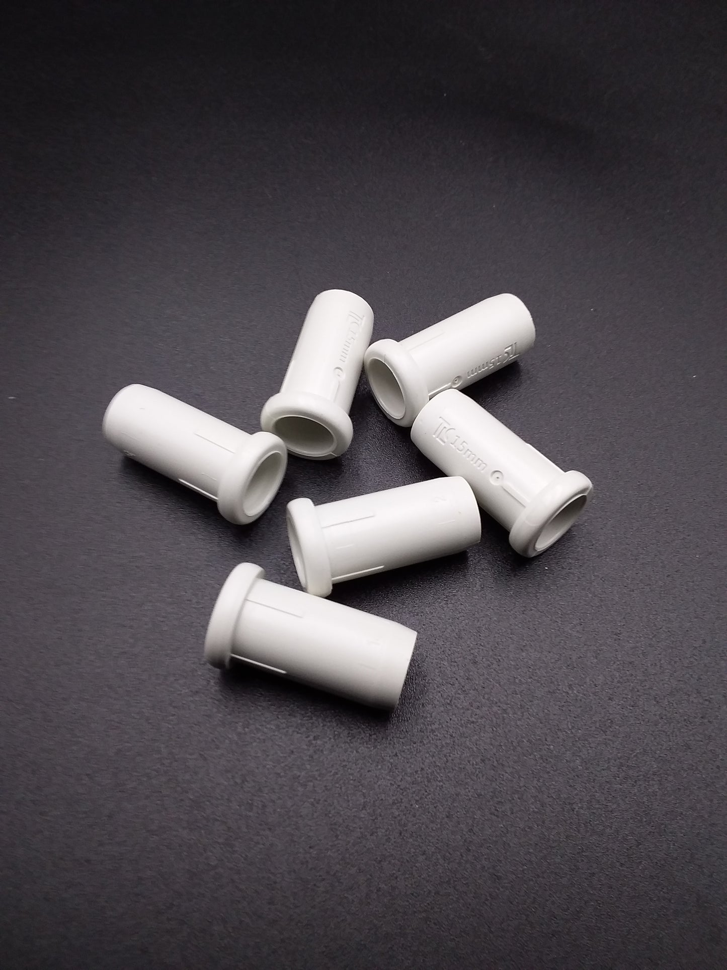
white 22mm plastic inserts for push fit fittings.