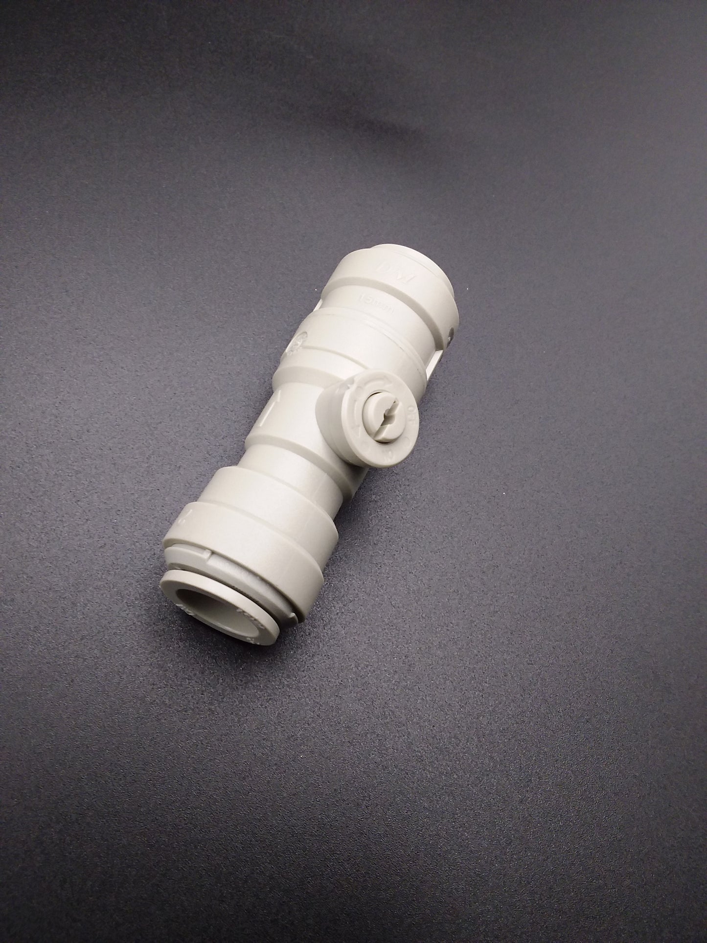 Pushfit plumbing isolating valve.
