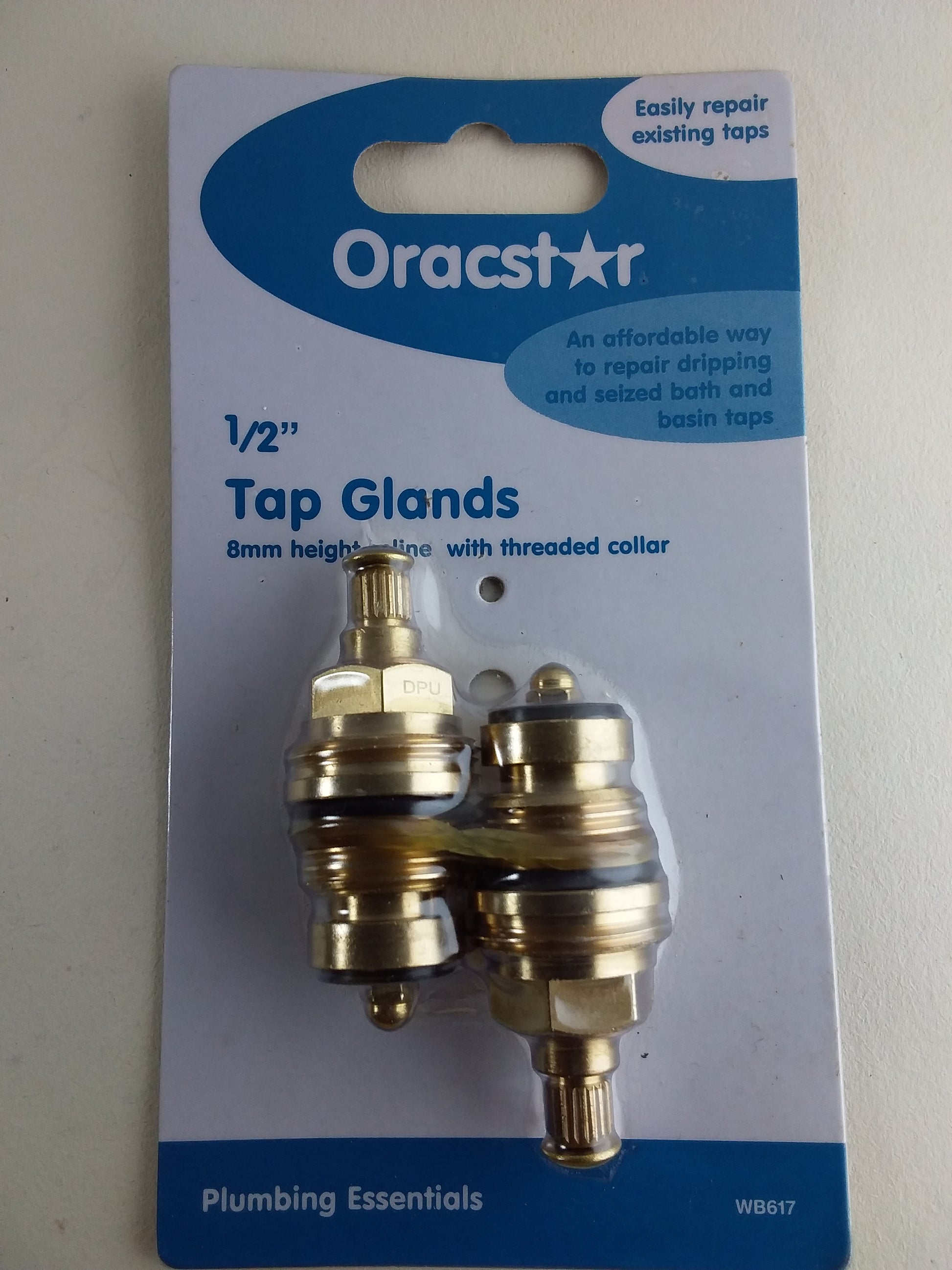 Pack of two Oracstar 1/2 inch tap glands with an 8mm height spline and threaded collar, displayed on a plumbing essentials card.